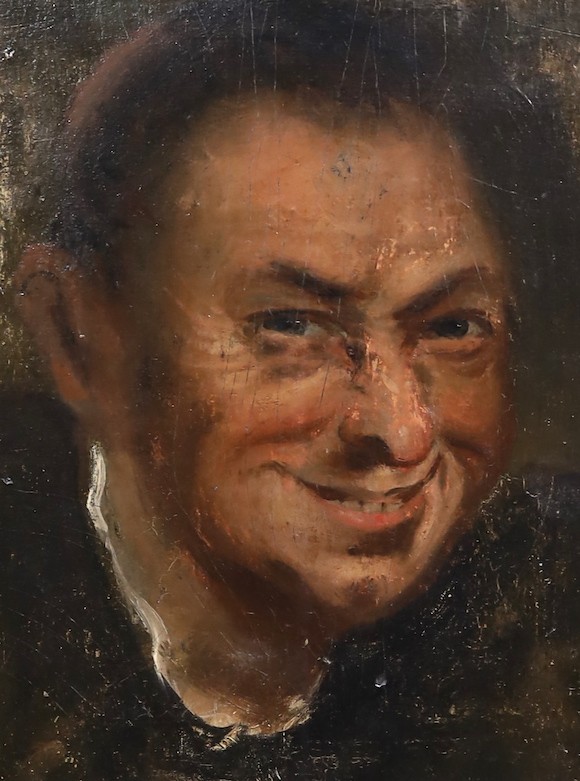 17th century Italian School , Head of a laughing man, oil on paper laid down on wood, 30 x 22cm, in a contemporary gilded wood frame.